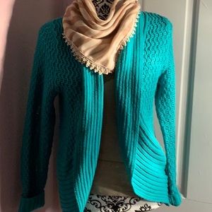 Blue knitted cardigan